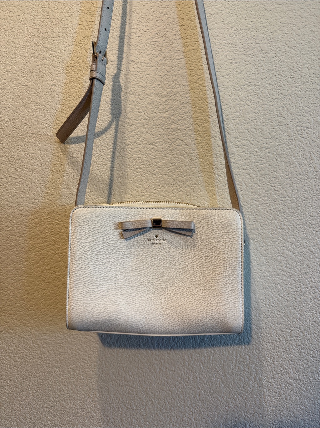Kate Spade White Pebbled Leather Crossbody With Bow Detail